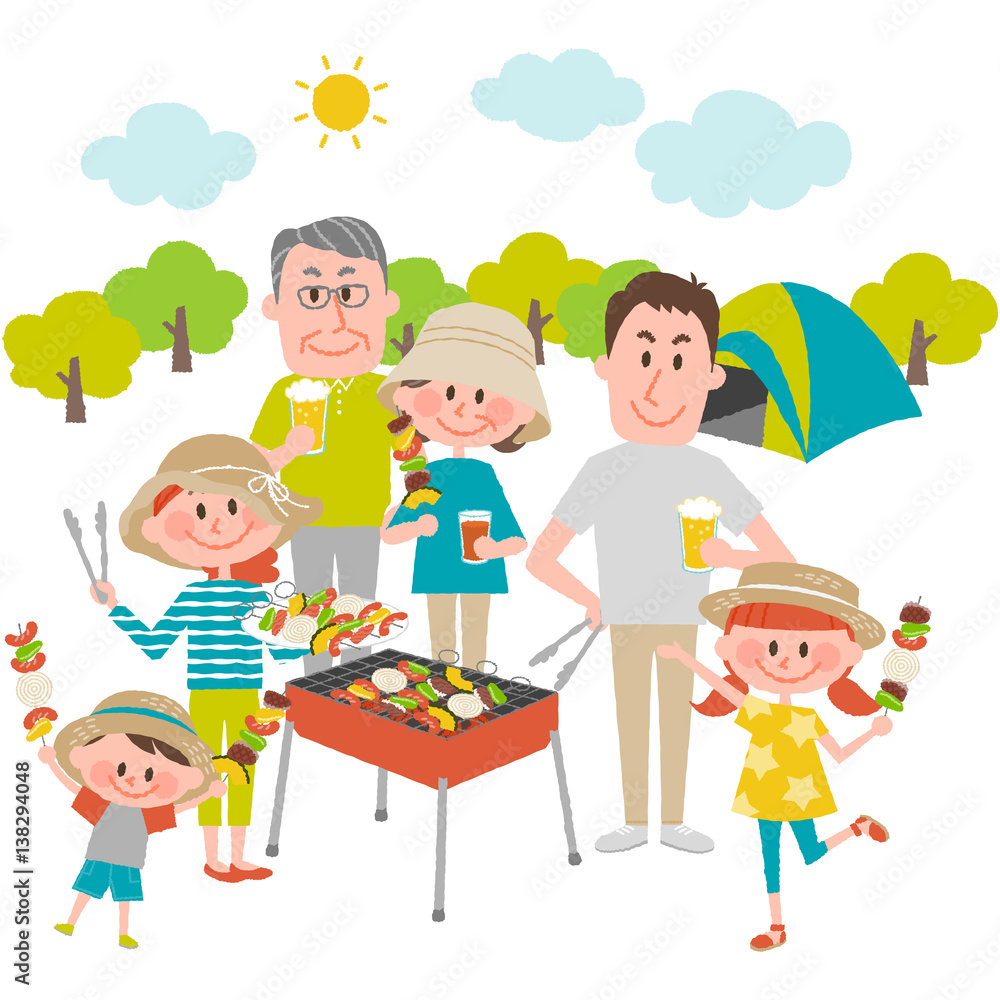 family enjoying barbecue outdoors