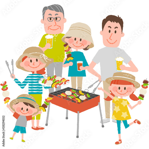 family enjoying barbecue outdoors