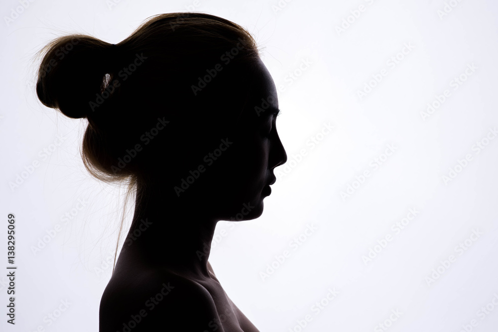 silhouette of beautiful young woman Stock Photo | Adobe Stock
