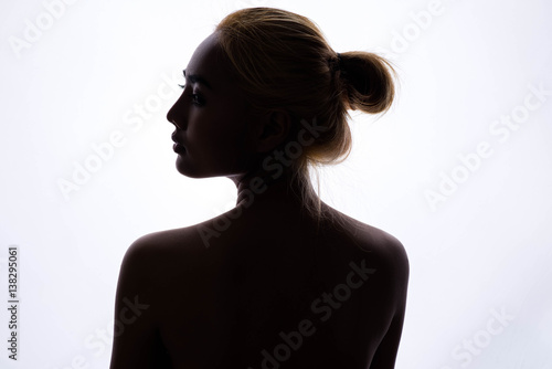 silhouette of beautiful young woman