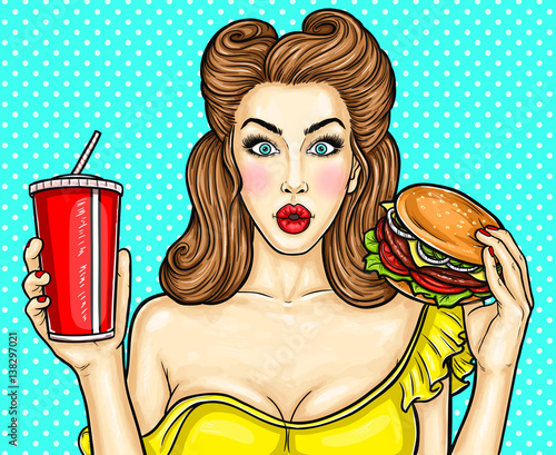 Sexy pop art girl holding a cocktail in her hand