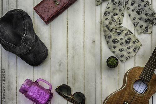 Ukulele hat wallets, sunglasses, mugs Purple Cactus small. White on the wooden floor