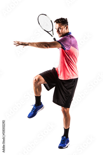 Young man playing tennis