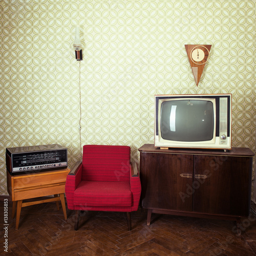 Konstfotografi Vintage room with wallpaper, tv, old fashioned armchair, retro player, loudspeak