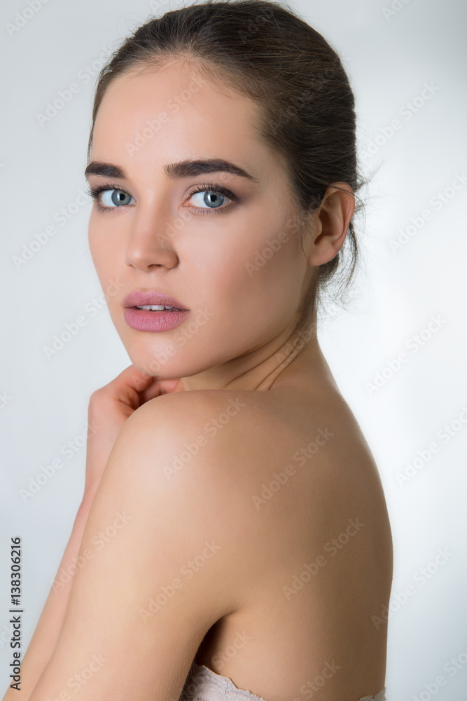 Beautiful Young Woman Touching Her Face With Palms. Beauty Female Portrait. Antiaging, Skincare, Beauty Treatment. Healthcare Concept. Beautiful Young Woman Touching Her Face With Palms. Beauty Female Portrait. Antiaging, Skincare, Beauty Treatment. Healthcare Concept.