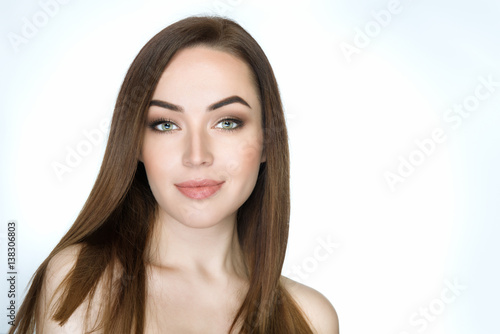 Beautiful female face closeup. Attractive girl's portrait.