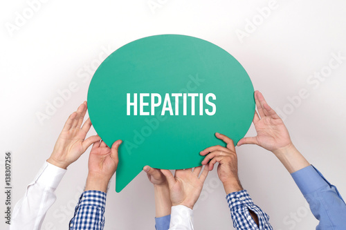 Group of people holding the HEPATITIS written speech bubble