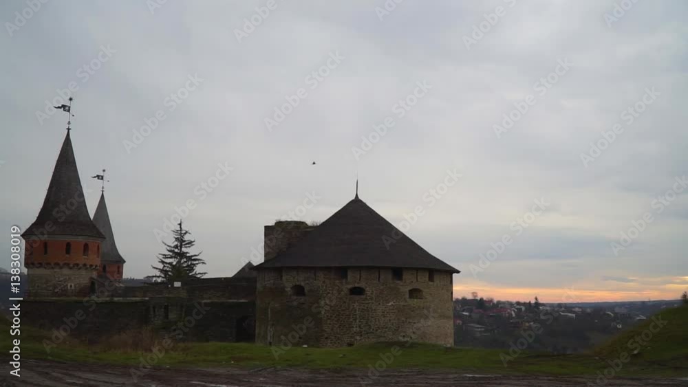 A view of the ancient castle on the background of the city A view of the ancient castle on the background of the city