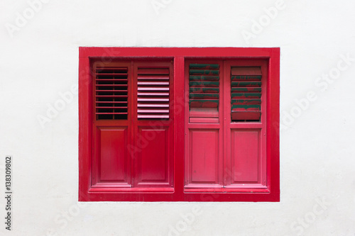 red window on white wall