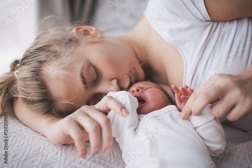 Portrait of mother and newborn baby. photo