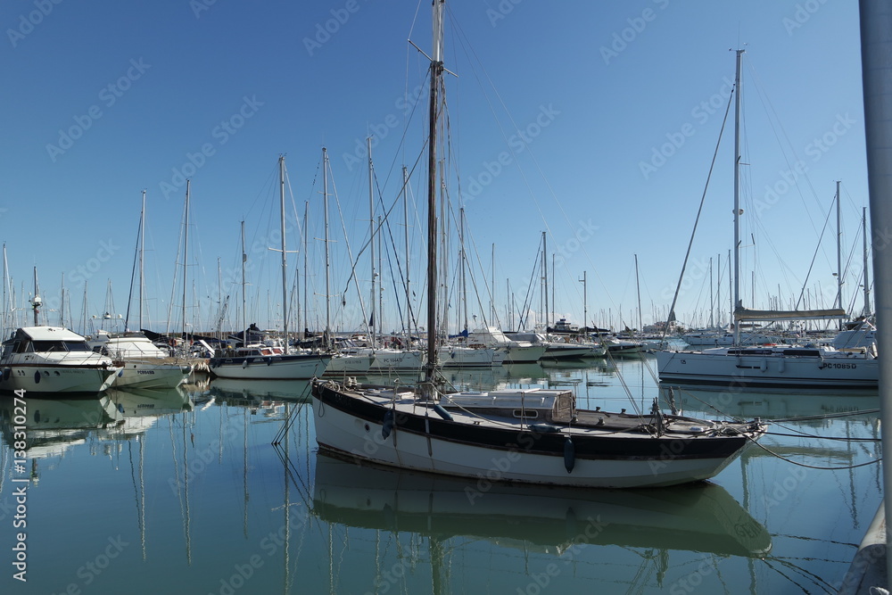 sailboat mast under the blue sky