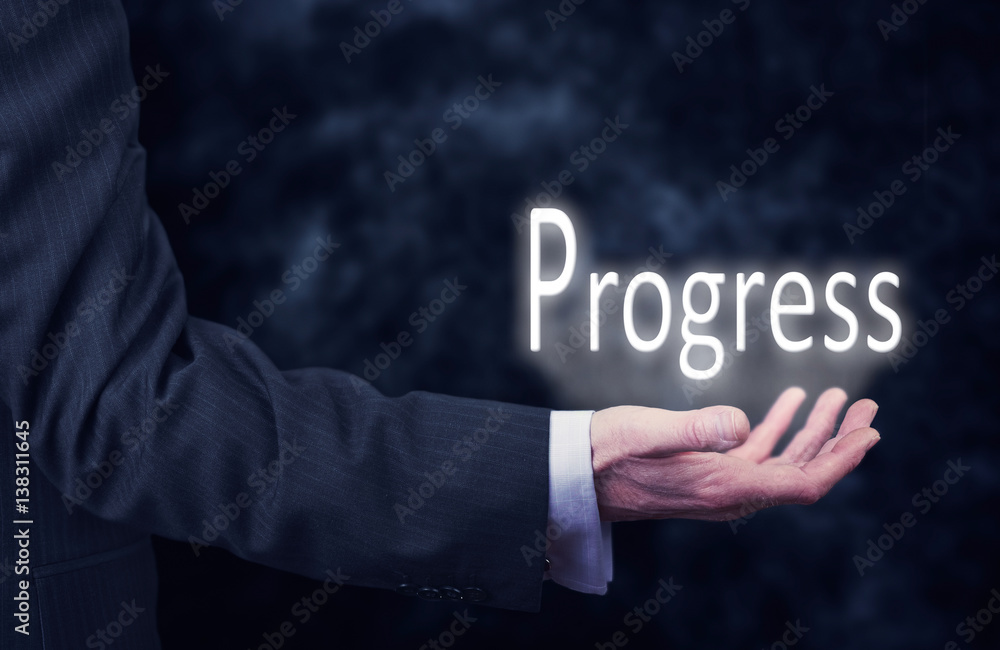 Hand holding a Progress Concept Hand holding a Progress Concept