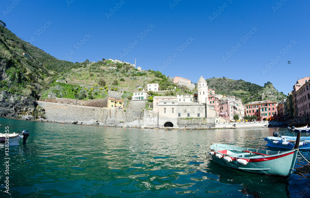 Colorful boats in the quaint port of Vernazza, Cinque Terre - Italy