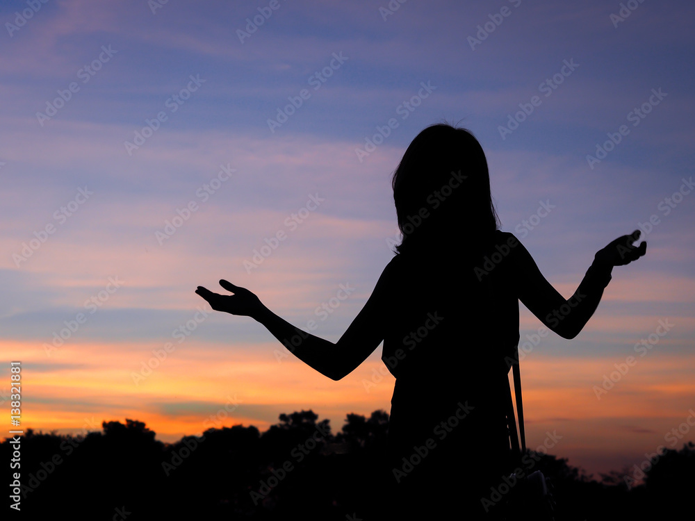portrait of girl as silhouette with twilight background