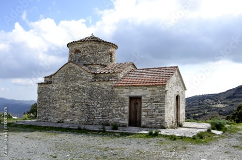 Architecture of old historic church  from Kato Lefkara village and cloudy sky photo