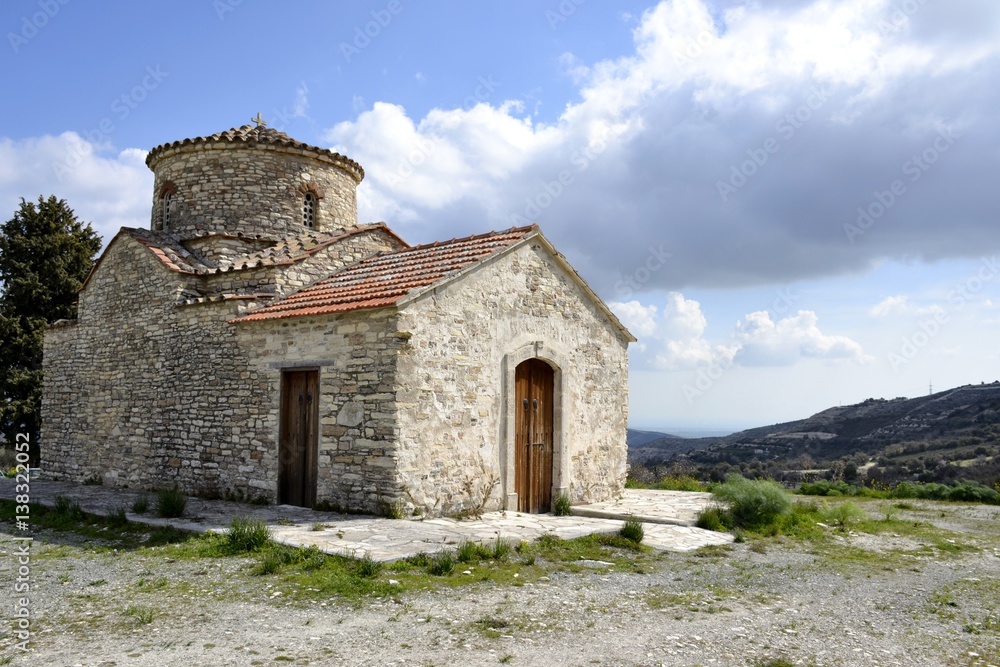 Architecture of old historic church  from Kato Lefkara village and cloudy sky