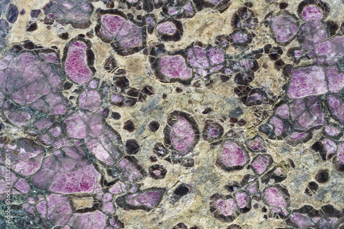 Mineral background. Eclogite stone macro detail. Geology gemstone photo