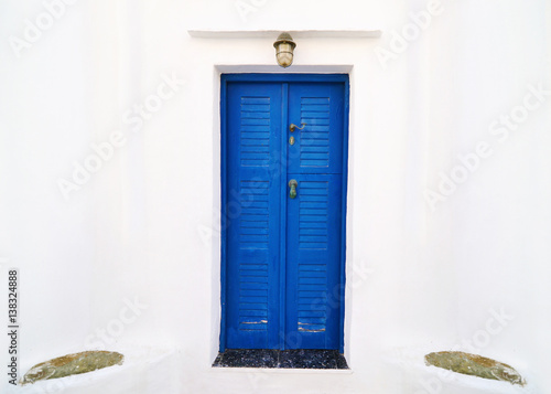 Cyclades architecture - traditional blue wooden door at Sifnos island Greece photo