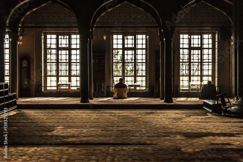 Praying in the Mosque  in Istanbul.