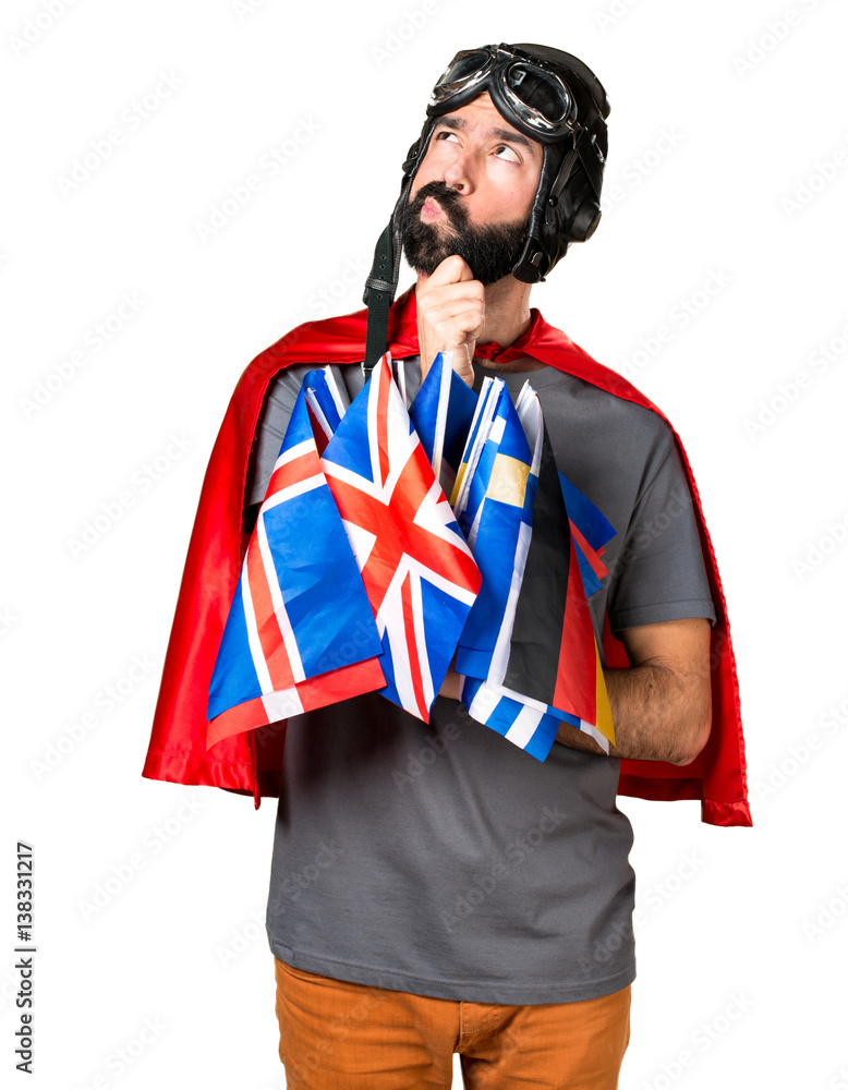 Superhero with a lot of flags thinking Superhero with a lot of flags thinking