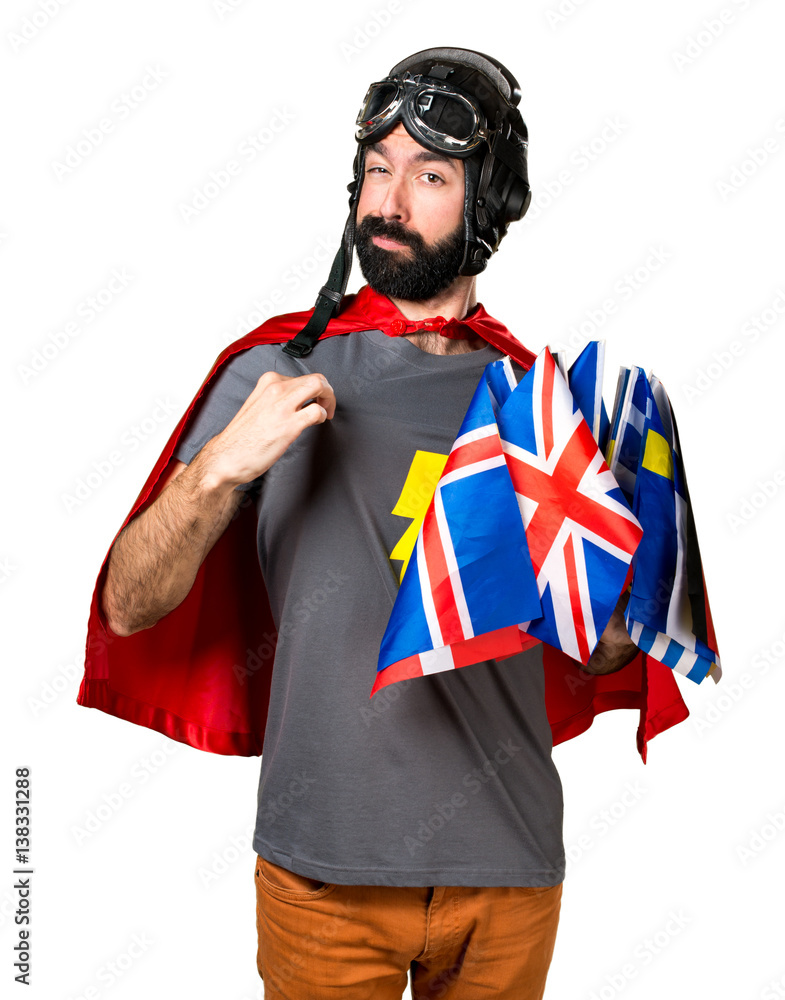Superhero with a lot of flags proud of himself Superhero with a lot of flags proud of himself