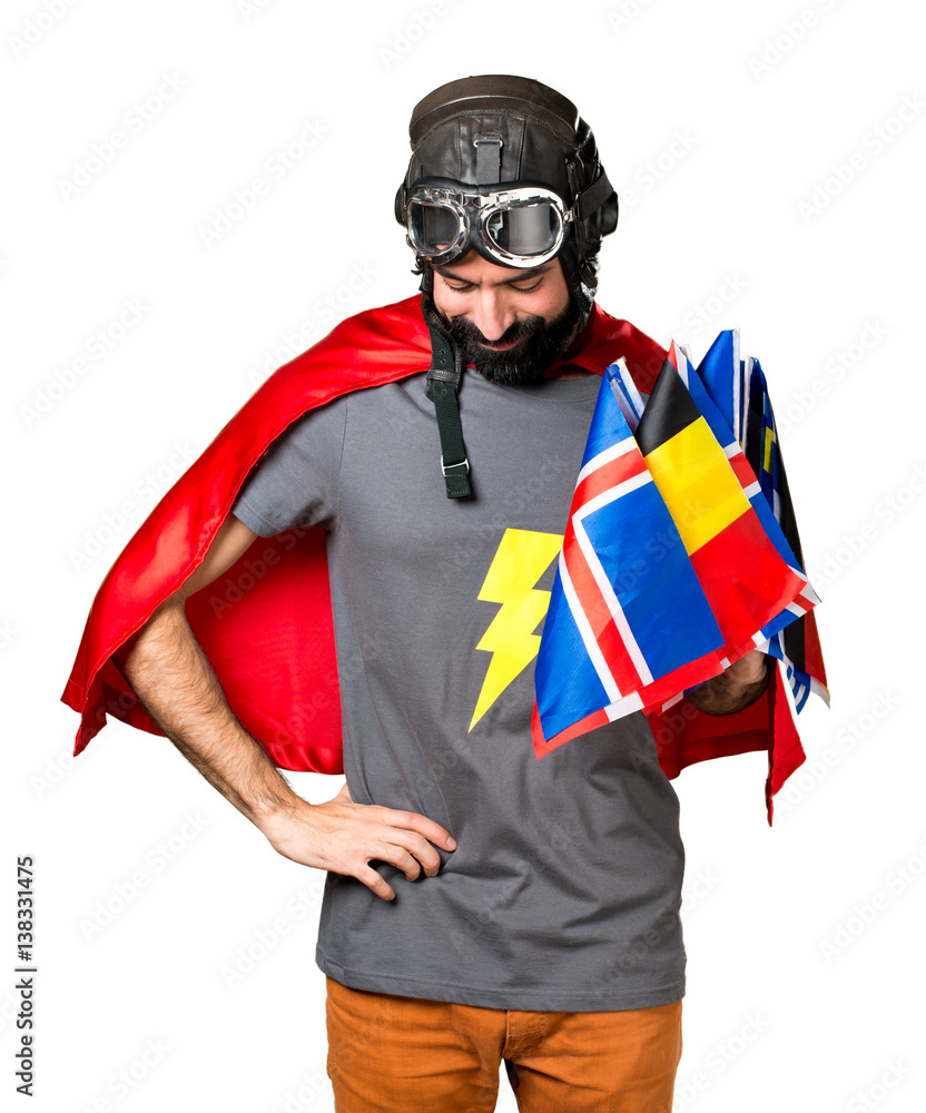 Superhero with a lot of flags looking down
