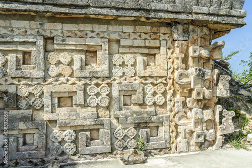 Wallpaper Mural detail of the reliefs and large masks of the god Chaac of the temple of the big Mayan pyramid in the archaeological Uxmal enclosure in yucatan, Mexico Torontodigital.ca
