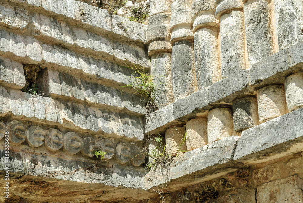 ornamental reliefs in a building in the Mayan archaeological Uxmal enclosure in Yucatan, Mexico.