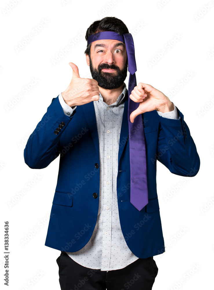 Crazy and drunk businessman making good-bad sign Crazy and drunk businessman making good-bad sign