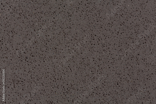 Synthetic quartz stone texture, dark grey tone.