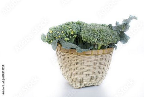 beautiful fresh Broccoli on handmade bamboo basket photo