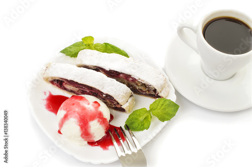 cherry strudel with ice cream and a cup of coffee