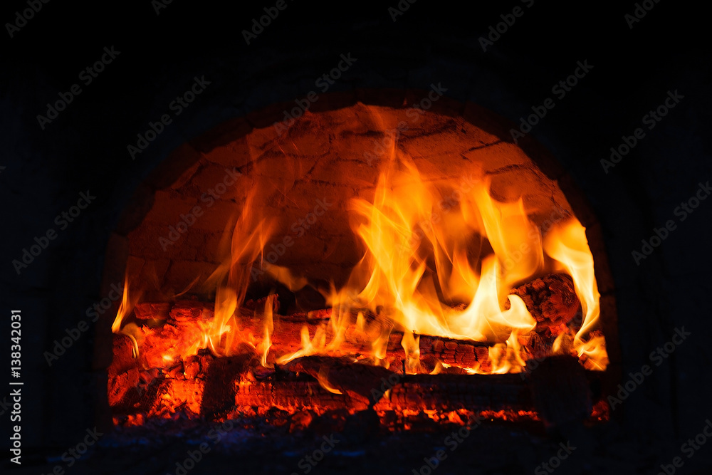 Fire burning in the fireplace. Fire burning in the fireplace.