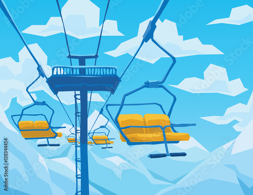 Winter scene with ski lift, mountains landscape and blue sky.