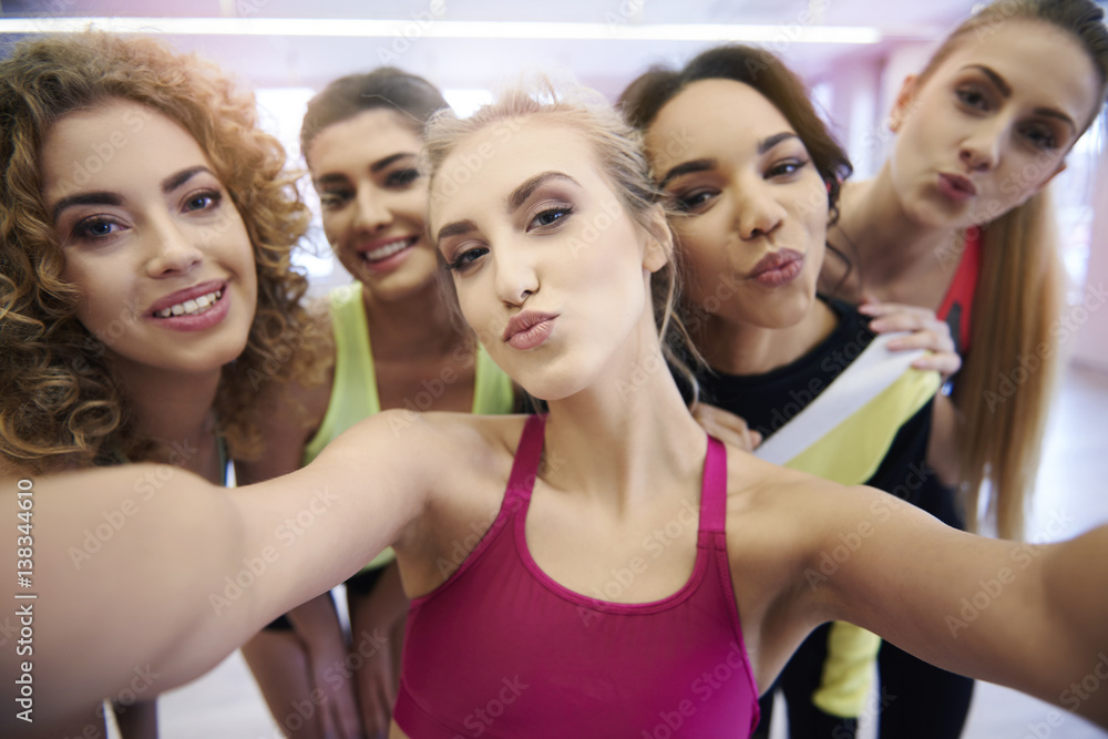 Gym girls taking a selfie on the aeorbic class