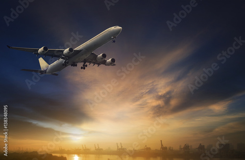 passenger plane flying on beautiful dusky sky