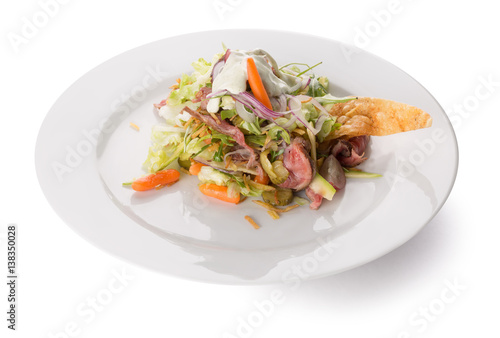 warm meat salad on a plate