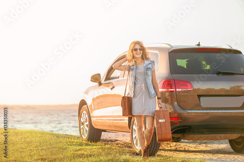 Beautiful young woman near ...