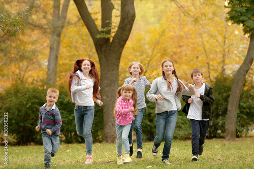 Sporty children running in the park