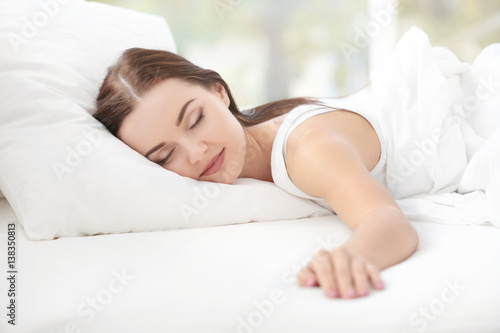 Young attractive woman slee...