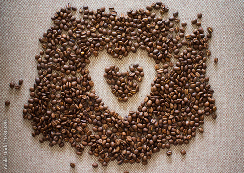 A Heart Shape Made Of Coffee Beans On The Textile Background © Iryna Chubarova