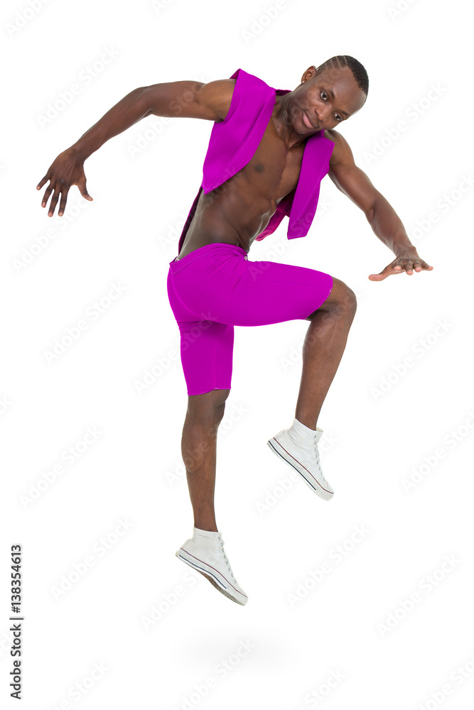 Disco dancer jumping against isolated white