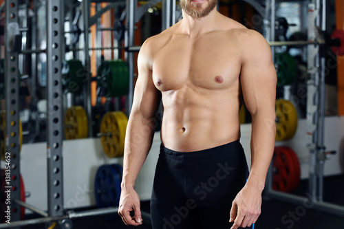 Sporty young man in gym