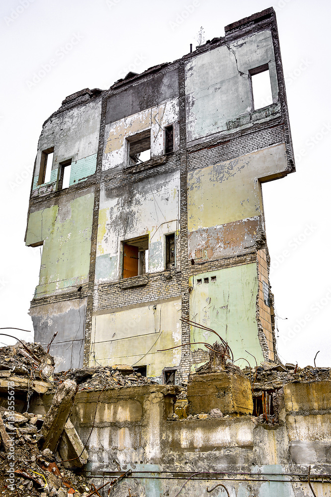 Pieces of Metal and Stone are Crumbling from Demolished Building Pieces of Metal and Stone are Crumbling from Demolished Building