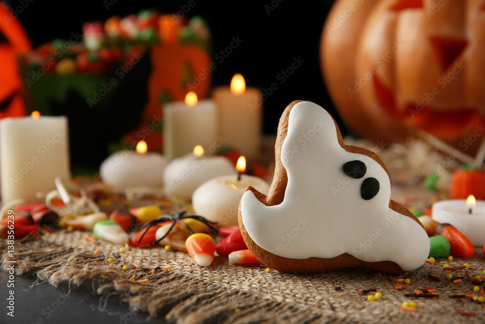 Halloween cookie and jelly sweets on sackcloth