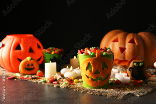 Halloween jelly sweets in bucket on table photo