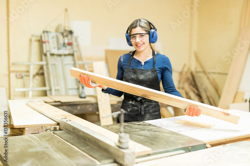 Hispanic female carpenter at work