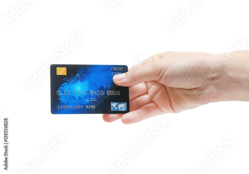 Hand holding credit card is...