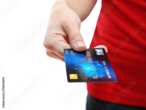 Woman holding credit card, ...