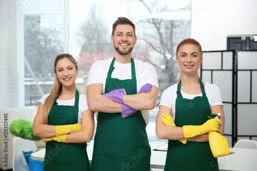 Cleaning service team at wo...
